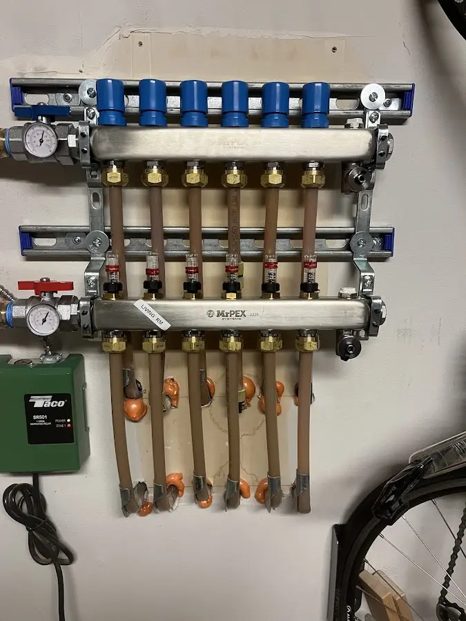 Plumber performing Gas Line Installation at a residential property in George Mason